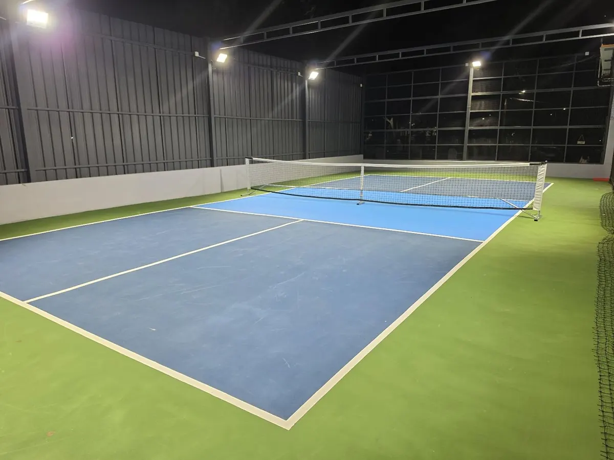 Blue and green synthetic court surface